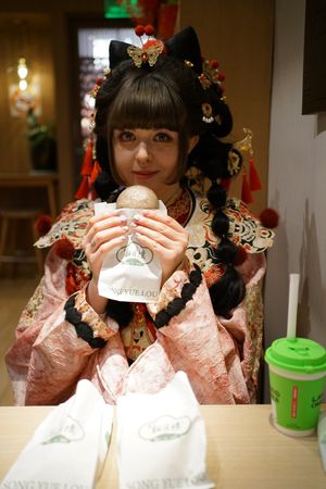 Enjoying sesame bun :D at Songyuelou in Shanghai