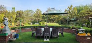 Lawn area of the house at Shreevanam By Beejom in Kuchesar