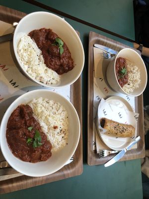 Vegan meatballs (peas based) in sauce & vegan sausage roll.   at MoMu Café in Antwerpen