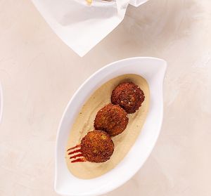 Garbanzo on top of more garbanzo, crunchy and creamy 🫠 at Hijo de Pita in Bogota