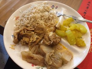 Winter melon with turmeric, boiled cabbage, tofu with tamarind, and brown rice. at Quay Cafe in Penang