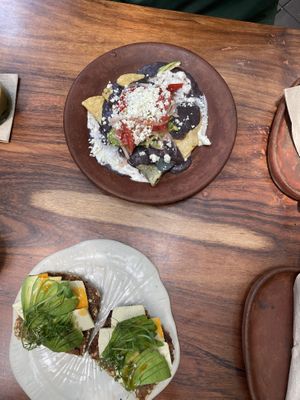 Enfrijolados y pan tostado a la Gómez (named after two cats!)  at Los Loosers in Mexico City