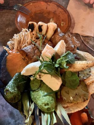 Molcajete con nopal, cebollitas, hongos, tortillitas at Los Loosers in Mexico City