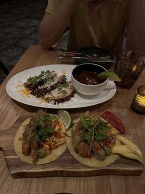 Birria tacos (top), banana flower tacos (bottom)  at Sentir in New York City