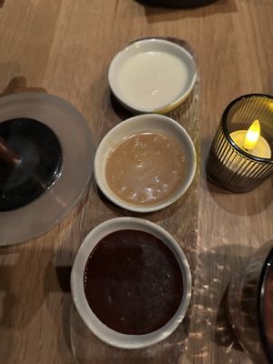Chocolate, caramel, and coconut dipping sauces for churros #Veganuary at Sentir in New York City