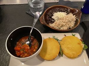 Arepitas with a side of arroz y frijoles 😋  at Sentir in New York City