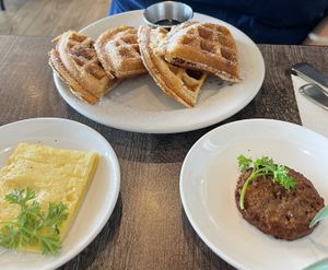 Vanilla waffles, side of plant based sausage and just egg patty  at Elise Cuisine in San Antonio