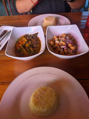 Vegetable Curry (made with Coconut milk) Tofu Sisig and Garlic Rice. They add a 10% service charge. at Olive Crib Bar and Restaurant in Palawan