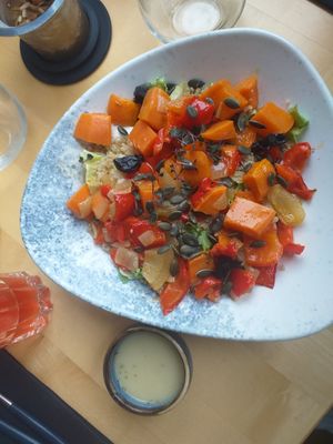 Sweet potatoes and quinoa salad with sauce. at Samsara in Cluj-napoca