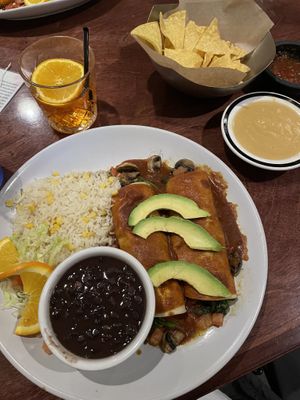 Vegan queso and spinach/mushroom enchiladas   at Fresa in Everett