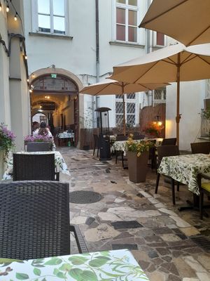 Outside area to eat at Piwnica pod Kominkiem in Krakow