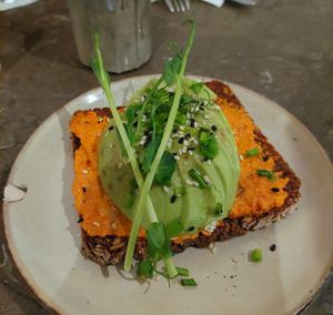 Danish sourdough, tomato/pesto, avocado. at OMAYMA Nytorget in Stockholm