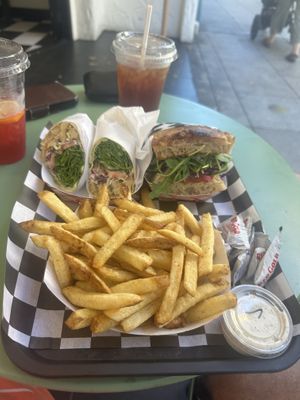 Chikn Caesar wrap, fries and high road sando with house-made focaccia, all vegan and all delicious with an ice tea and a hibiscus Arnold Palmer   at Pretty Good Advice - Santa Cruz in Santa Cruz