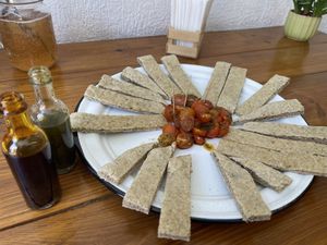 Fresh focaccia with cherry tomatoes and homemade oils   at Casa Ceiba  in San Luis Potosi