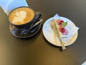 Oat latte and raspberry cheesecake   at Sativo  in Puerto Varas