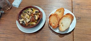 Mushroom ajillo with toasted baguette at Vegan Eat Tokyo in Tokyo