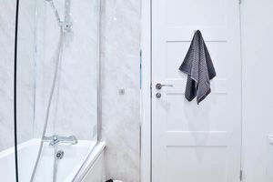 Bathroom - with a shower bath. The bathroom is stocked with towels, bamboo toilet roll and refillable bathroom soap at Selbrooke House in Bristol