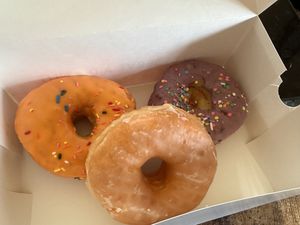 Orange flavor donut (left)   at UFFDA Donuts in Maple Grove