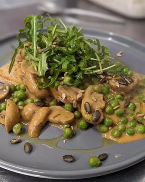 Creamy mushrooms and peas on sourdough   at Luna Plant Based Kitchen in Frome