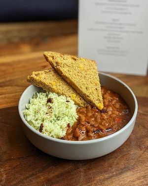 Bean chilli with wholegrain rice & homemade cornbread  at Luna Plant Based Kitchen in Frome