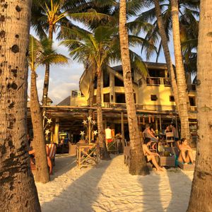 the view of the restaurant from the beach at Ambassador In Paradise Resort in Boracay