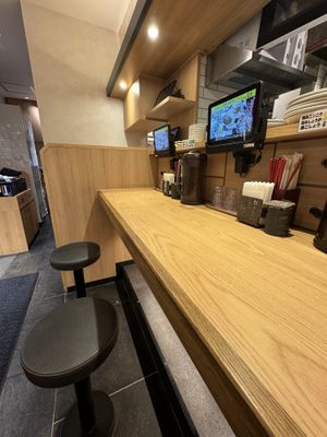 Single seats .  at Ramen Kiou - JR Shin-Osaka Station in Osaka