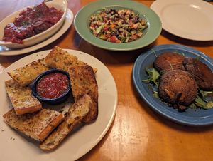 Meatballs, salad, garlic bread, portabello at Bella Monica Cucina & Vino in Raleigh