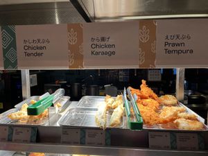 Vegan tempura options on top shelf   at Marugame Udon - Kensington Arcade in West London