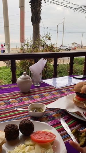 Falafel with mustard sauce and lentil burger (both adapted vegan)  at Otra Cosa in Huanchaco