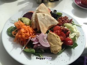 Fresco's Vegan Salad, complete with guacamole, hummus, sun-dried tomatoes, peppers, red onions, beetroot, tomatoes, carrot, olives, baby spinach and warm pitta bread. Wonderful! at Cafe Fresco in Lagos