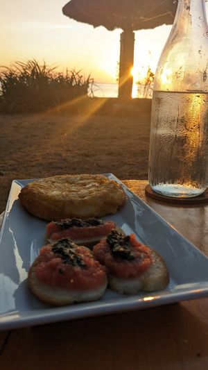 Spanish Omelette (200PHP | 3.6$) comes with extra tasty bruschetta at Belle's Beach Bar in San Juan