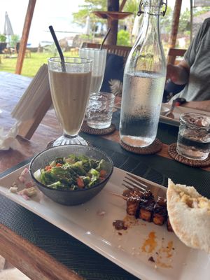 Sorry, half eaten tofu satay  at Belle's Beach Bar in San Juan