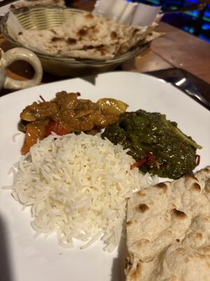 Aloo palak and mushroon curry with plain naan and basmati  at Namaste Indian Restaurant in Manuel Antonio