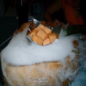 Melon atop dry ice at Pure Lotus - Jìng Xīn Lián 净心莲 in Beijing