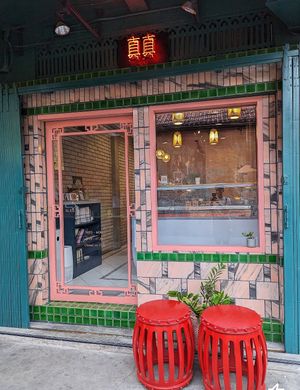 Shop front with some outdoor seating   at Jing Jing Ice Cream Bar & Cafe in Bangkok