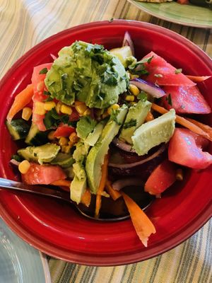 Vegan “Chiquita Salad” with avocados, carrots, tomatoes, corn, red onions, cilantro and lime juice squeezed on top.  at Mamacita's  in Borovets