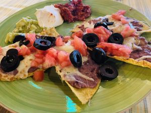 Tacos (we ordered with no ham). Optional to order with no cheese - add avocado and cashews for VEGAN option .  at Mamacita's  in Borovets