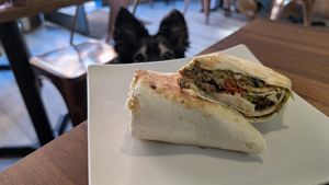 Vegan wrap with square sausage, avocado/guacamole, haggis and brown sauce at Brunch  in Glasgow