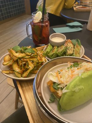 Cucumber salad, bang bao with Tofu, veggie dumplings and homemade Berry iced tea… Food was delicious, the iced tea was very very Sweet  at Home of Dumplings in Berlin