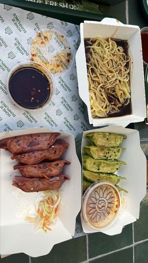 Dumplings and saucy noodles.  at Home of Dumplings in Berlin
