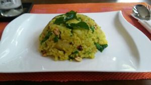 Beautiful flattened rice dish with nuts at Suananda Vegetarian Garden in Bangkok