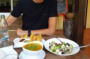 Good food = happy face.  at Suananda Vegetarian Garden in Bangkok
