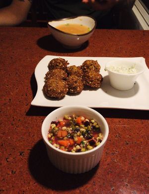 Mung bean lemon salad, falafel fritters, spicy miso mushroom soup  at Suananda Vegetarian Garden in Bangkok