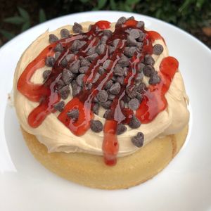 Peanut Butter Frosting, Chocolate Chips, and Strawberry Jam! at Cinnaholic - South Loop in Chicago