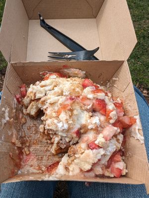 Strawberry cheesecake type of toppings  at Cinnaholic - South Loop in Chicago