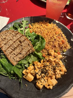 Spicy tofu and golden ricee  at Secrets Chueca in Madrid