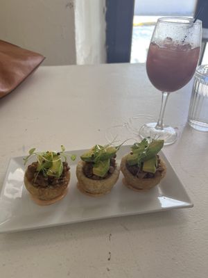 Yucca baskets with lentils and St Germain cocktail   at St Germain Bistro and Cafe in San Juan