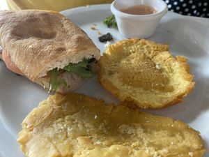 Vegan steak sandwich with tostones  at St Germain Bistro and Cafe in San Juan