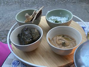 Starters with rice filled wine leafs, pita bread , tsaziki and eggplant cream   at The Crazy Little Greek in Berlin