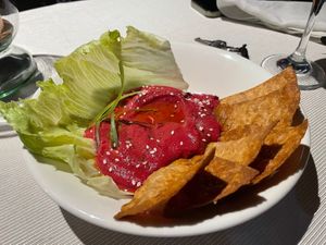 Beetroot hummus and tortilla chips at Iguana Crossing Boutique Hotel in Puerto Villamil